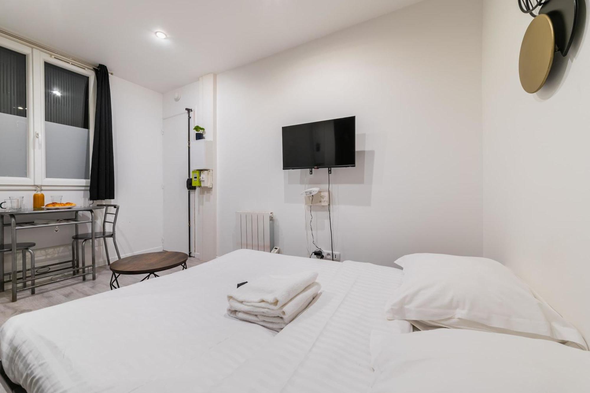 Appartement Fonctionnel Hopital Bichat - 18 - 2p - Flat-guest Parijs